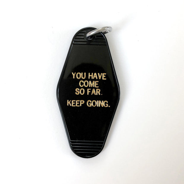 Keep Going Motel Keychain