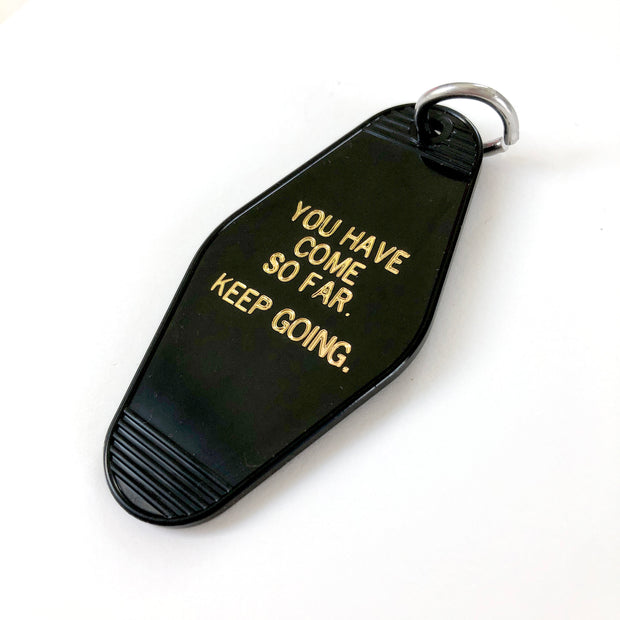Keep Going Motel Keychain